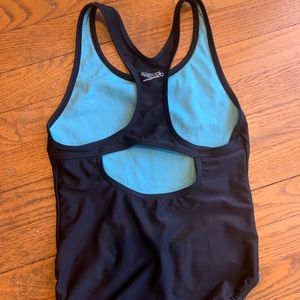 Solid black speedo bathing suit